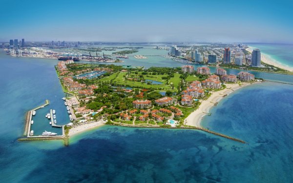 Fisher Island condos for sale aerial private island Miami Beach luxury